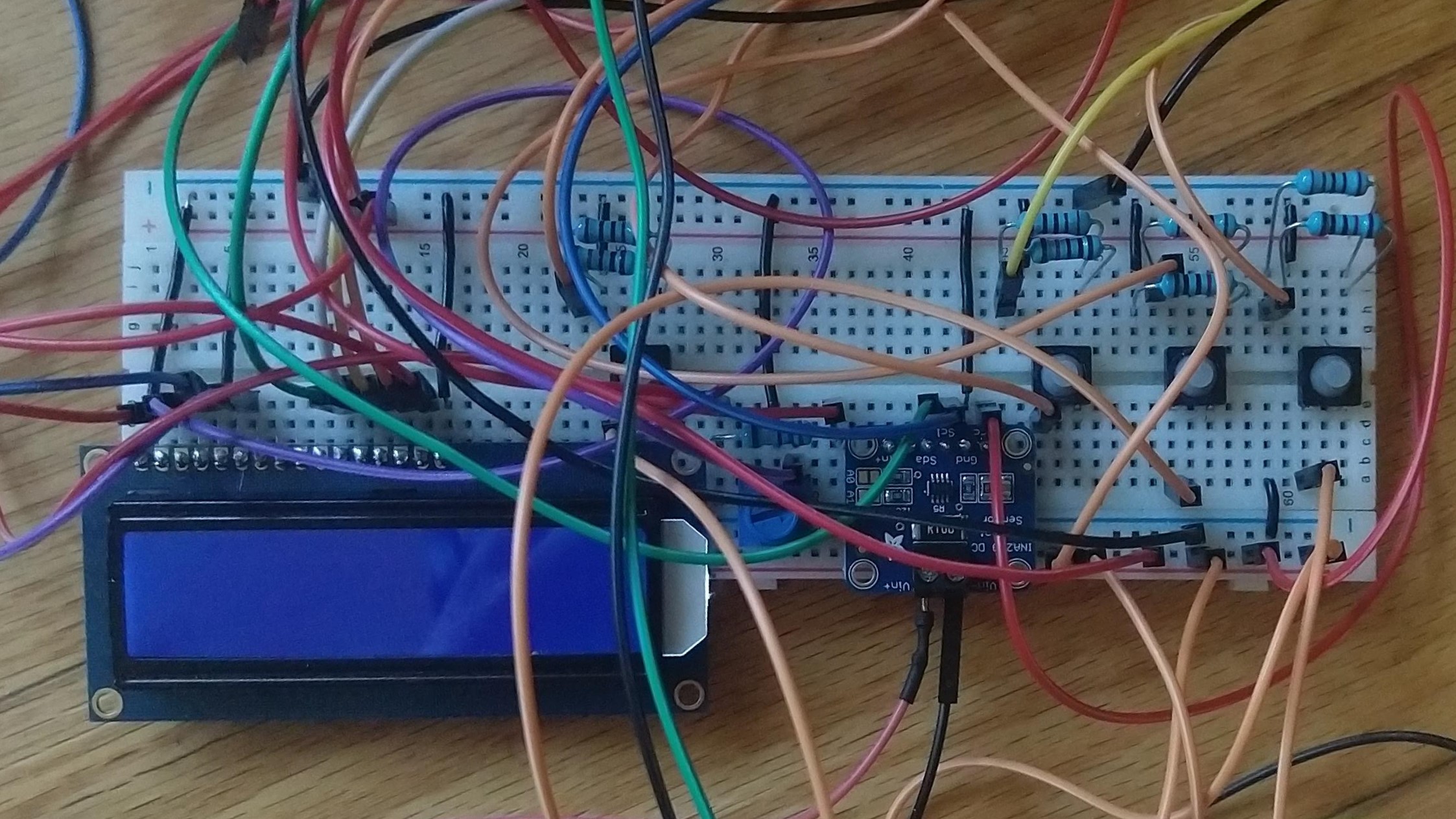 Breadboard with screen and buttons.