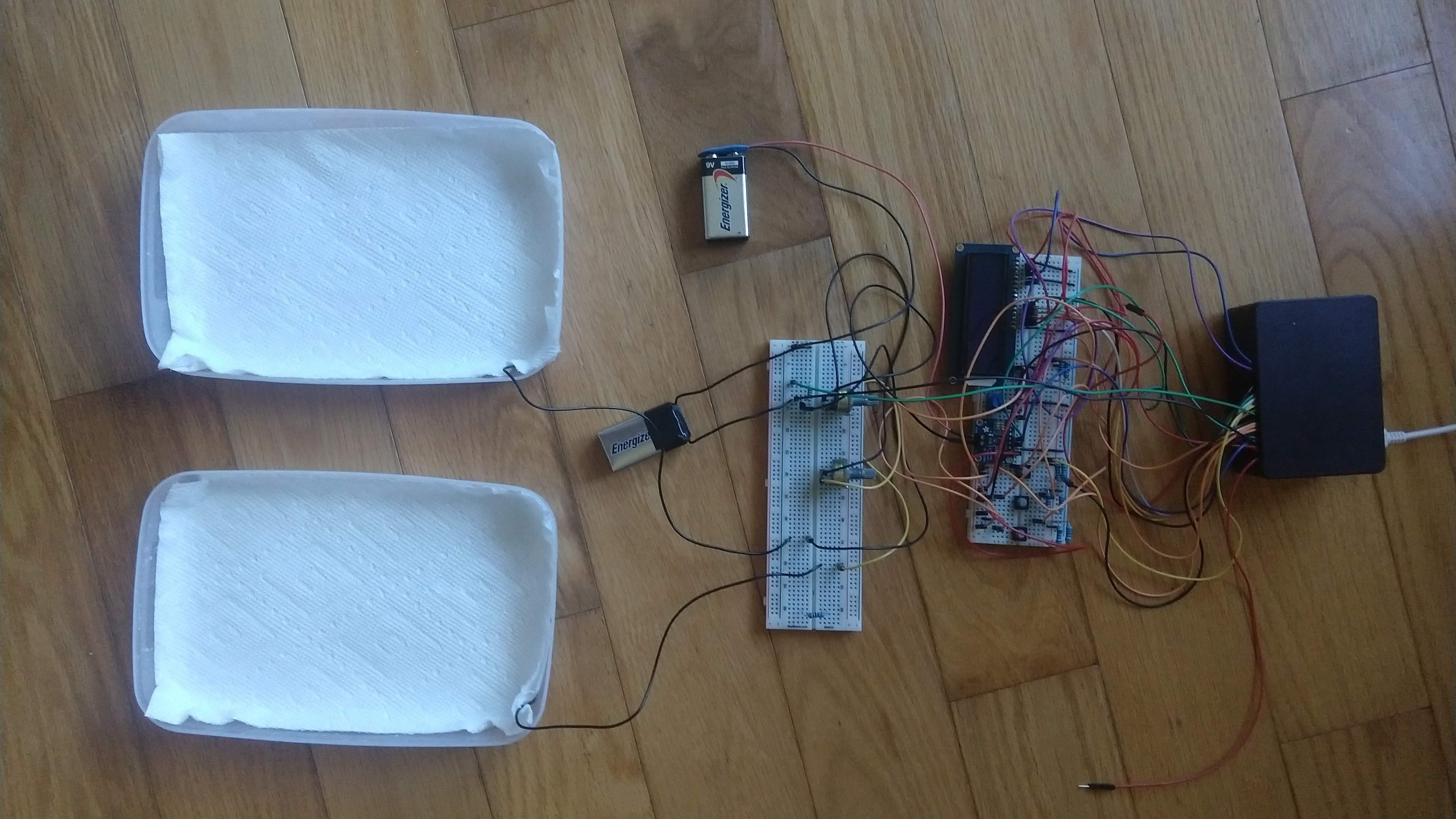 Setup of the testing circuit and iontophoresis device.  Shows two 9V batteries, however, in the end only one was used.